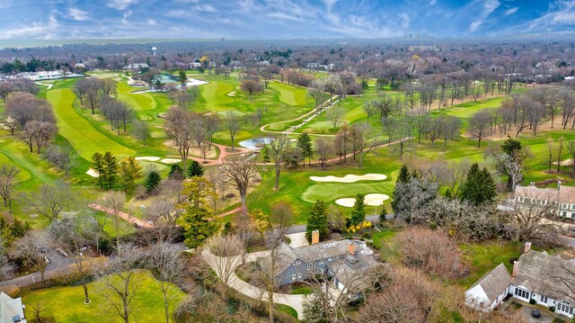 birds eye view of property with a residential view and view of golf course