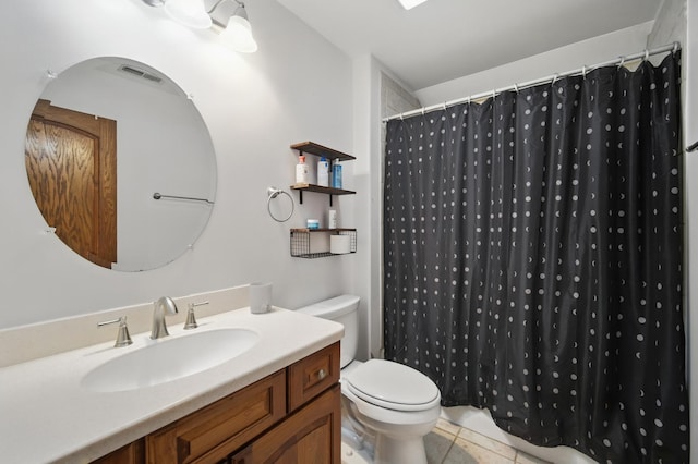 full bathroom with a shower with curtain, tile patterned floors, toilet, and vanity