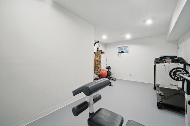 exercise room featuring baseboards and recessed lighting