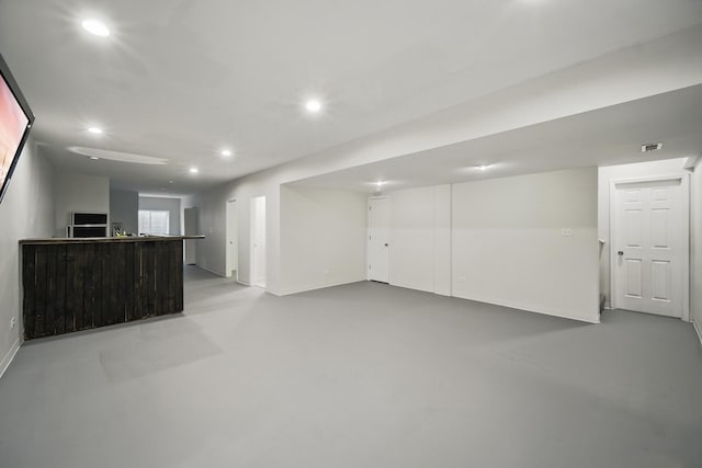 basement with visible vents and recessed lighting