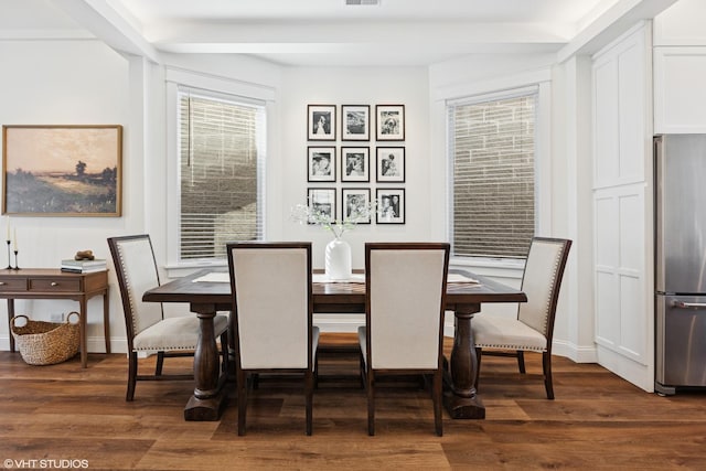 dining area with baseboards, visible vents, and dark wood-style floors