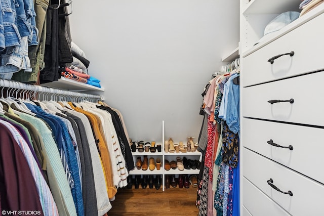 spacious closet featuring wood finished floors