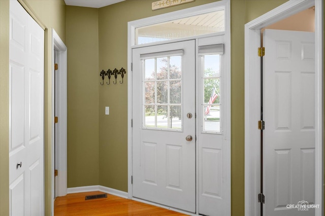 2823 White Thorn Cir, Naperville, IL 60564 - doorway to outside featuring light wood-style flooring and baseboards