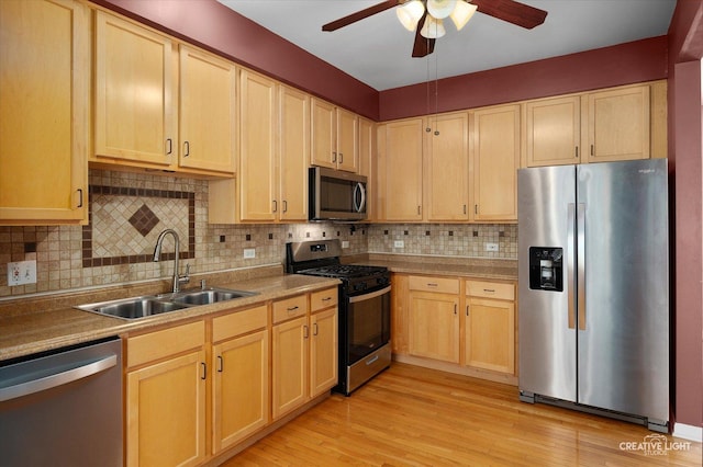 2823 White Thorn Cir, Naperville, IL 60564 - kitchen with stainless steel appliances, a sink, light brown cabinetry, and a ceiling fan