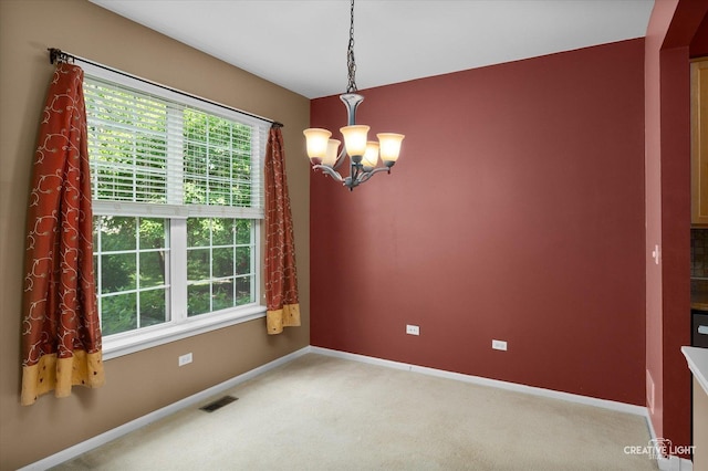 2823 White Thorn Cir, Naperville, IL 60564 - unfurnished room with a chandelier, light colored carpet, and baseboards