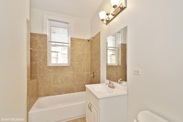 full bath featuring vanity, toilet, bathtub / shower combination, and plenty of natural light