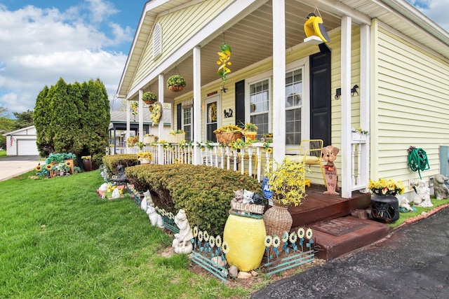 exterior space with a yard and a porch