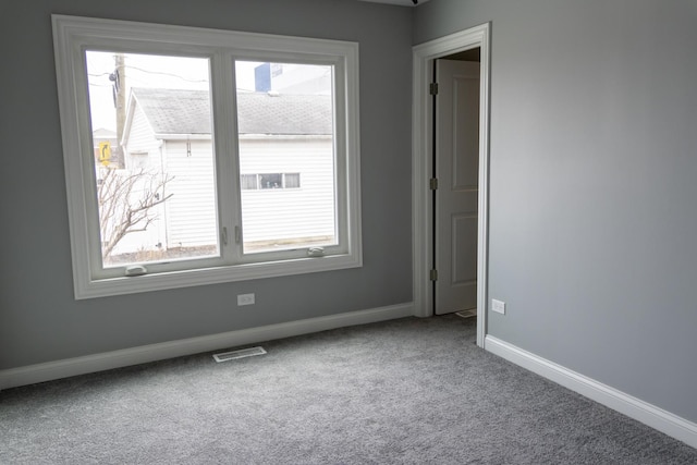 4147 Prairie St, Schiller Park, IL 60176 - empty room featuring baseboards, carpet flooring, and visible vents