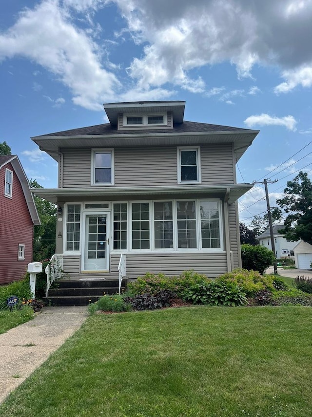 211 W 13th St, Sterling, IL 61081 - traditional style home with a front lawn and entry steps