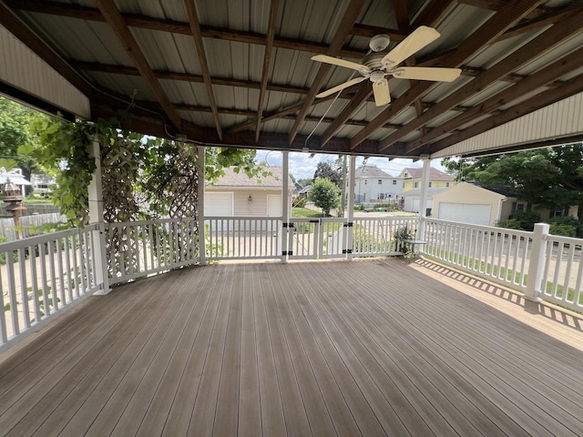 211 W 13th St, Sterling, IL 61081 - wooden deck featuring an outbuilding, a residential view, and ceiling fan