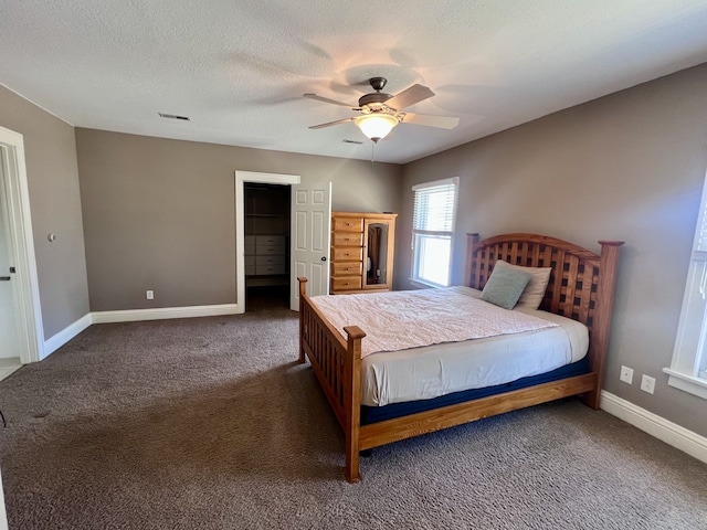 211 W 13th St, Sterling, IL 61081 - carpeted bedroom with baseboards and ceiling fan