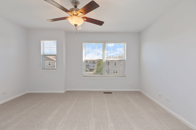 3576 Gabrielle Ln, Aurora, IL 60504 - unfurnished room with ceiling fan, light colored carpet, and baseboards