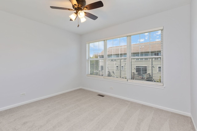 3576 Gabrielle Ln, Aurora, IL 60504 - carpeted empty room featuring baseboards and ceiling fan