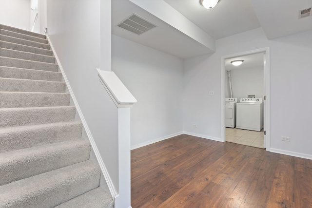 3576 Gabrielle Ln, Aurora, IL 60504 - stairs featuring washing machine and dryer, wood-type flooring, and baseboards