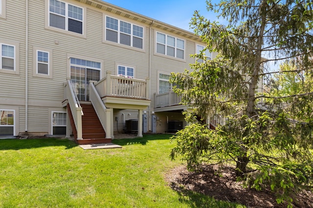 3576 Gabrielle Ln, Aurora, IL 60504 - back of property with stairs, a lawn, and central AC