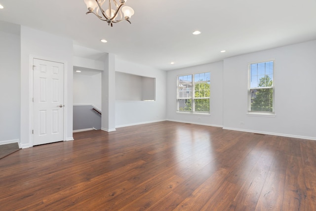 3576 Gabrielle Ln, Aurora, IL 60504 - unfurnished room featuring a chandelier, dark wood-type flooring, baseboards, and recessed lighting