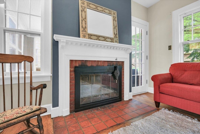 708 W Church St, Champaign, IL 61820 - living room with a brick fireplace and baseboards