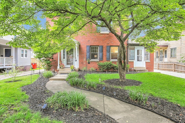 708 W Church St, Champaign, IL 61820 - view of front of house featuring brick siding
