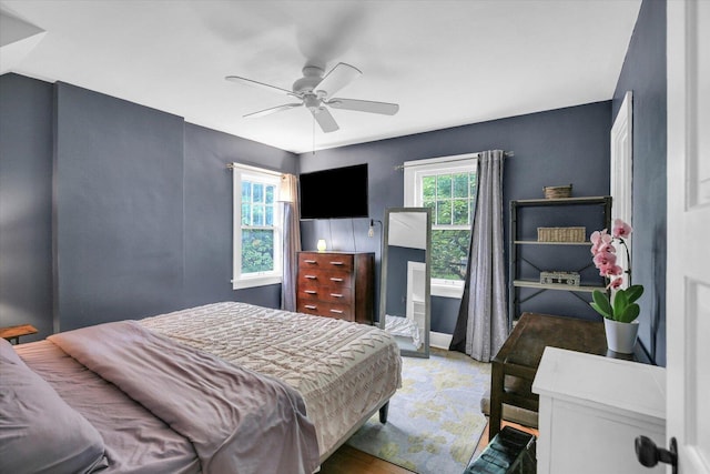 708 W Church St, Champaign, IL 61820 - bedroom with ceiling fan and baseboards