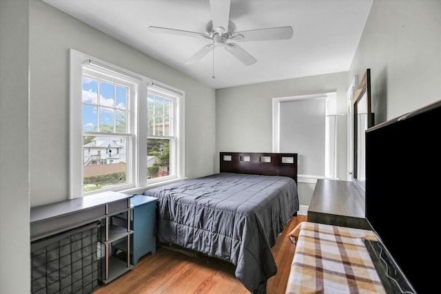708 W Church St, Champaign, IL 61820 - bedroom with wood finished floors and ceiling fan