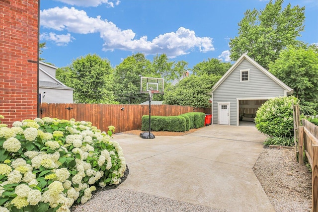 708 W Church St, Champaign, IL 61820 - view of patio / terrace with a garage and an outdoor structure