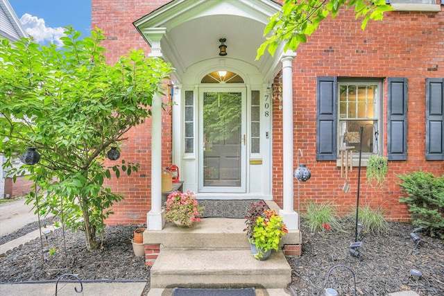 708 W Church St, Champaign, IL 61820 - property entrance featuring brick siding