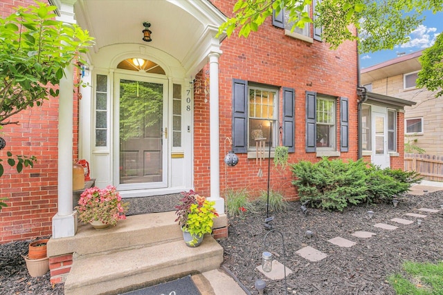 708 W Church St, Champaign, IL 61820 - property entrance featuring brick siding