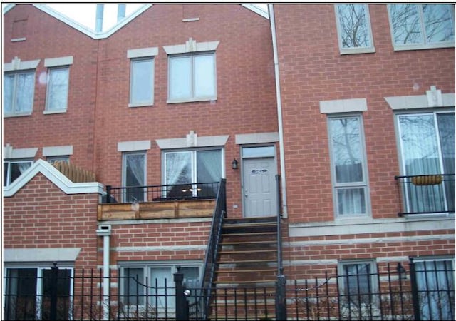 view of property featuring fence