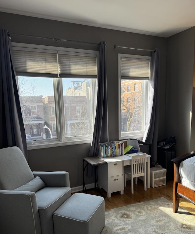 bedroom with wood finished floors