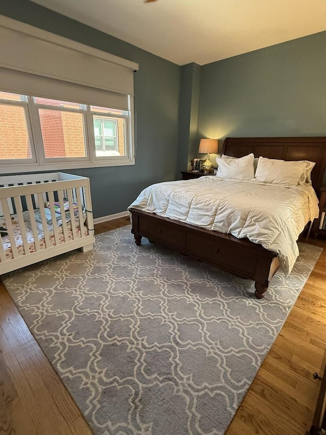 1542 W School St Unit G, Chicago, IL 60657 - bedroom with wood finished floors and baseboards