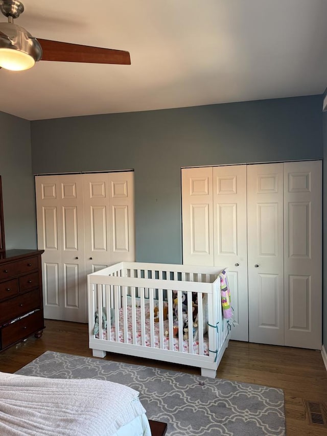 1542 W School St Unit G, Chicago, IL 60657 - bedroom with wood finished floors, ceiling fan, and a nursery area