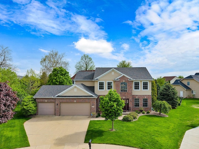 colonial home with an attached garage, brick siding, driveway, and a front lawn