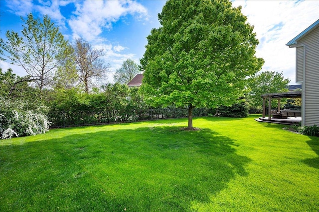 view of yard featuring fence