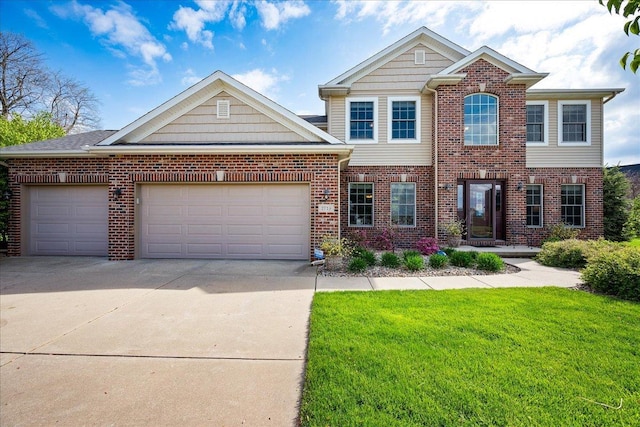 view of front of house featuring an attached garage, a front lawn, brick siding, and driveway