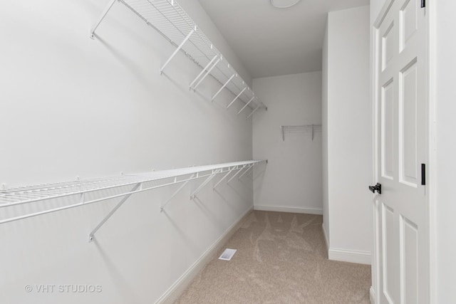 3607 Greystone Ave, Naperville, IL 60564 - walk in closet featuring light colored carpet