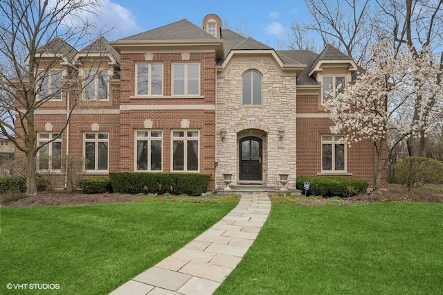 4020 Noble Ct, Northbrook, IL 60062 - view of front of property featuring a front lawn, stone siding, and brick siding