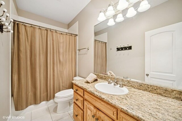 4020 Noble Ct, Northbrook, IL 60062 - bathroom with tile patterned floors, vanity, toilet, and shower / bath combination with curtain