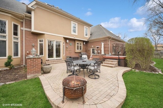 4020 Noble Ct, Northbrook, IL 60062 - view of patio / terrace featuring an outdoor fire pit, outdoor dining space, and a hot tub
