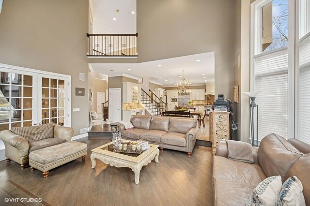 4020 Noble Ct, Northbrook, IL 60062 - living room with a high ceiling, stairway, wood finished floors, a chandelier, and recessed lighting