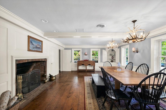2066 County Road 125 E, Mahomet, IL 61853 - dining space with a wealth of natural light, dark wood-style floors, an inviting chandelier, and ornamental molding