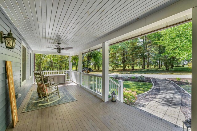 2066 County Road 125 E, Mahomet, IL 61853 - wooden terrace with a porch and ceiling fan