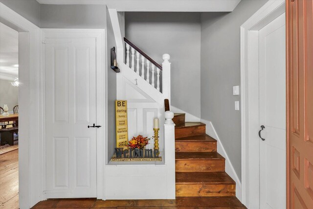 2066 County Road 125 E, Mahomet, IL 61853 - staircase featuring baseboards and wood finished floors