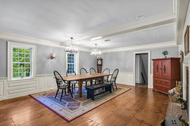 2066 County Road 125 E, Mahomet, IL 61853 - dining room with crown molding, an inviting chandelier, wainscoting, and hardwood / wood-style flooring