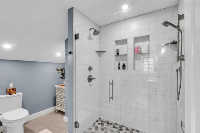 2066 County Road 125 E, Mahomet, IL 61853 - bathroom with toilet, baseboards, a stall shower, and tile patterned flooring