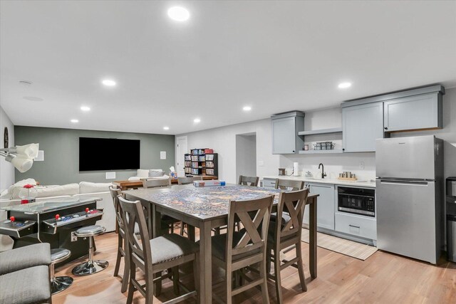 2066 County Road 125 E, Mahomet, IL 61853 - dining area with light wood-type flooring and recessed lighting