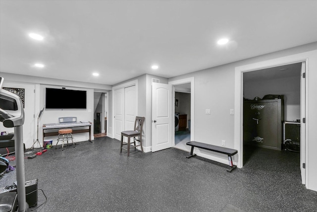 2066 County Road 125 E, Mahomet, IL 61853 - exercise room featuring washer / clothes dryer and recessed lighting