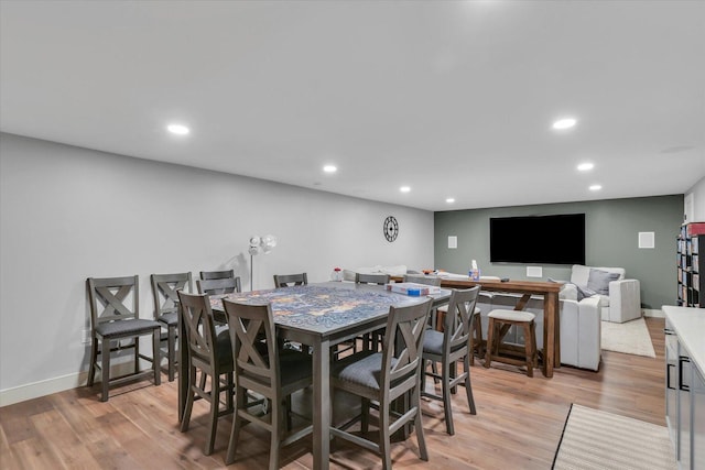 2066 County Road 125 E, Mahomet, IL 61853 - dining space featuring light wood-style flooring, recessed lighting, and baseboards