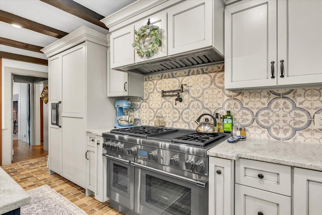 2066 County Road 125 E, Mahomet, IL 61853 - kitchen with beamed ceiling, double oven range, light stone counters, brick floor, and backsplash