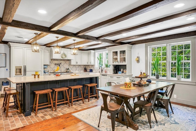 2066 County Road 125 E, Mahomet, IL 61853 - dining area with recessed lighting, brick floor, baseboards, and beam ceiling