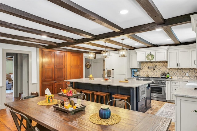 2066 County Road 125 E, Mahomet, IL 61853 - dining area with recessed lighting, light wood-style floors, and beam ceiling